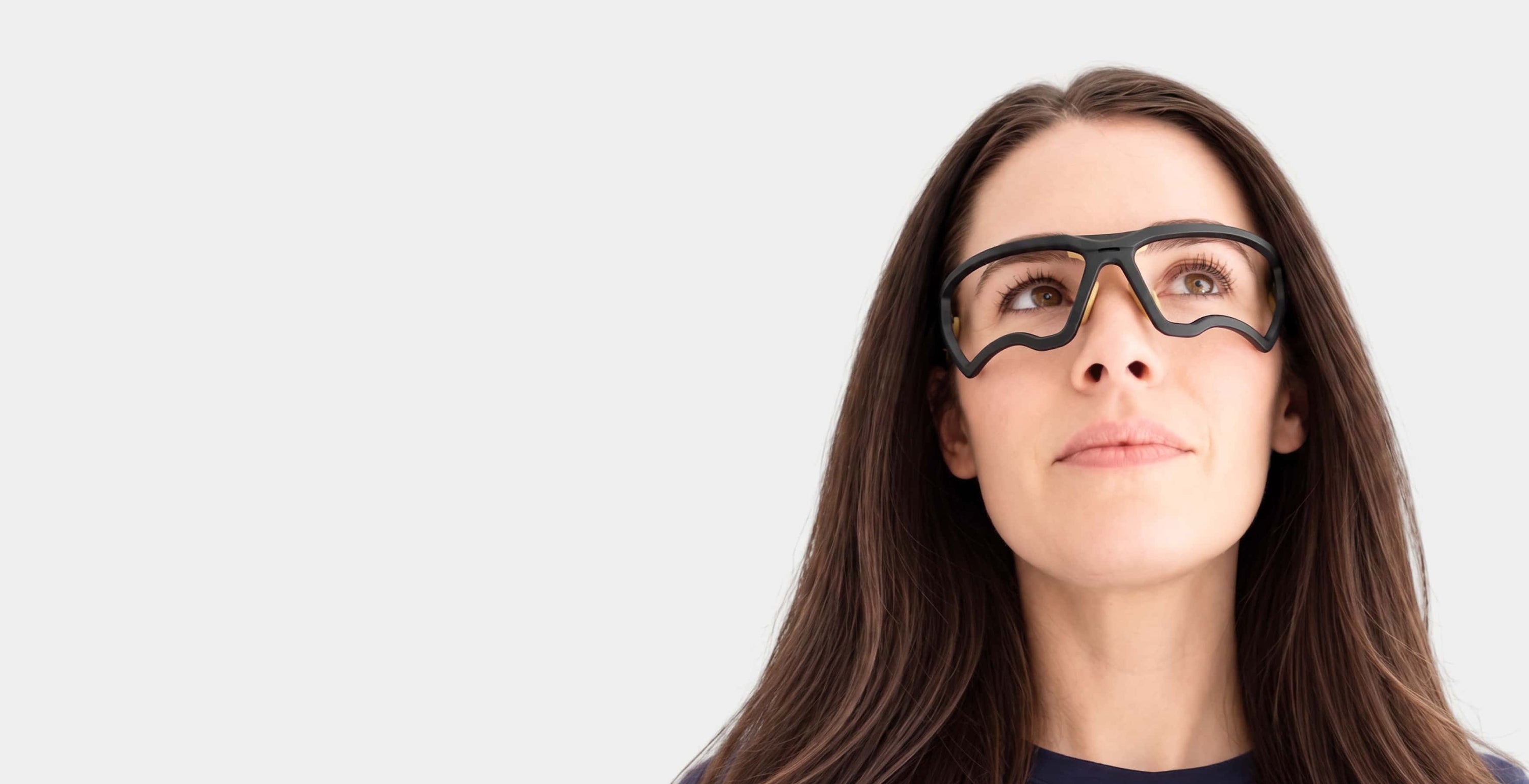 Pickleball player at the kitchen line wearing Kitchen Blockers lens-free eye protection